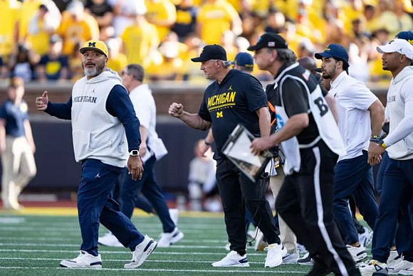 Kyle Whittingham and Michigan Team