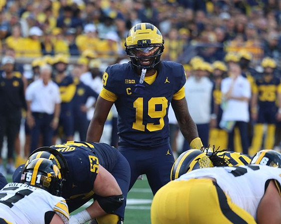 Jake Guarnera (53) and Bryce Underwood (19)
