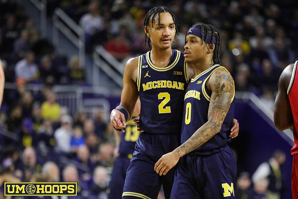 Kobe Bufkin (2) and Dug McDaniel (0)