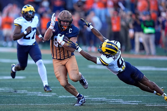 Tyler McLaurin (27) and Semaj Morgan (0)