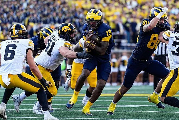 Bryce Underwood (19) and Hogan Hansen (80)