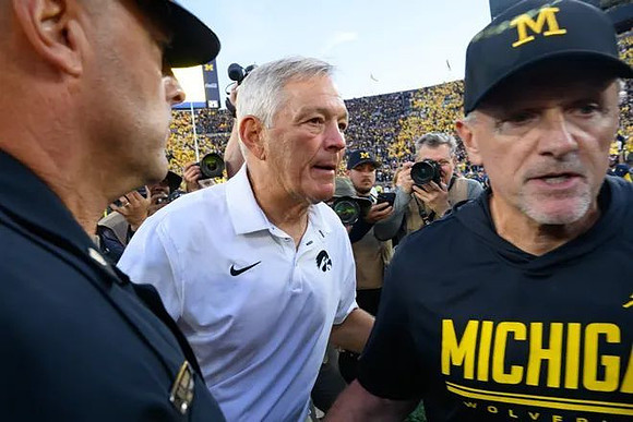 Iowa Head Coach Kirk Ferentz and Kyle Whittingham