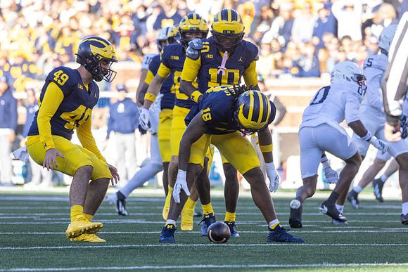 Nico Crawford (49), Troy Bowles (18), and Zeke Berry (10)