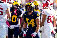 Jyaire Hill (0) and Nathaniel Staehling (44)