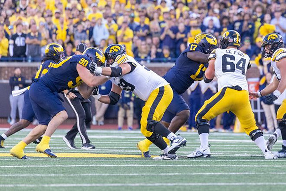 John Henry Daley (90), Enow Etta (17), and Troy Bowles (18)