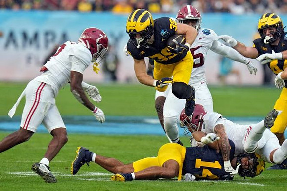Joe Taylor (39), Channing Goodwin (14), and Max Bredeson (44)