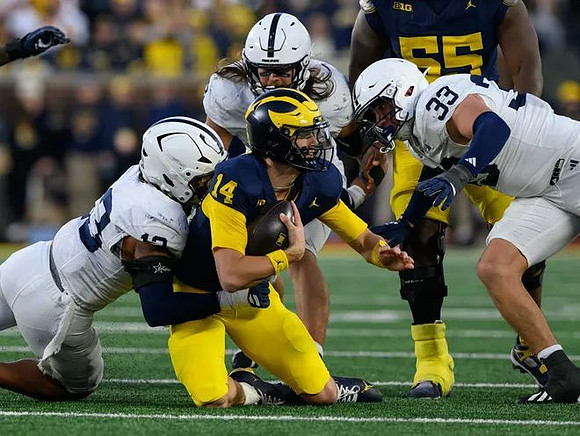 Tommy Carr (14) and Nathan Efobi (55)
