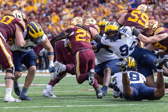 Nate Marshall (94), Dom Nichols (8), and John Henry Daley (90)
