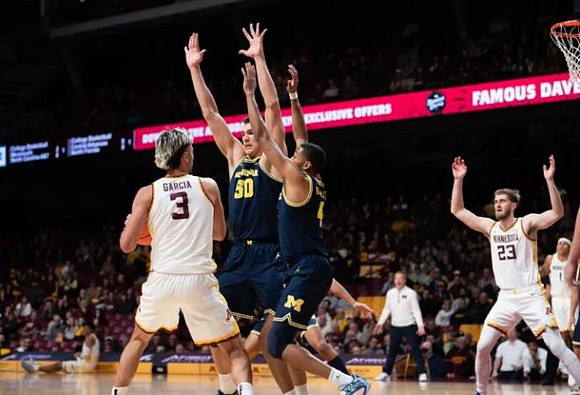 Vladislav Goldin (50) and Nimari Burnett (4)