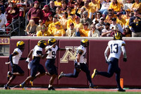 Nathaniel Staehling (44) and Michigan Team