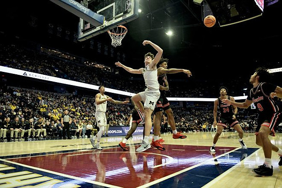 Jalen Reed (19) and J.P. Estrella (13)