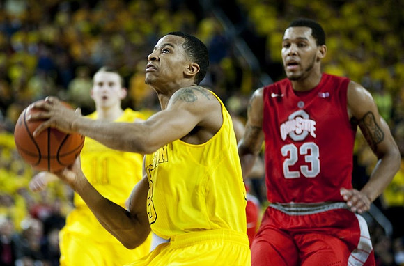 Nik Stauskas (11) and Trey Burke (3)