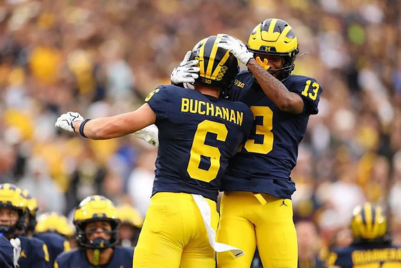 JJ Buchanan (6) and Travis Johnson (13)