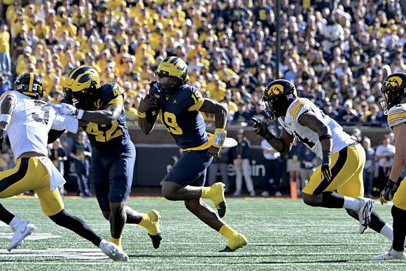 Jalen Hoffman (42) and Bryce Underwood (19)