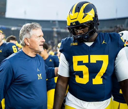 Kyle Whittingham and Travis Moten (57)
