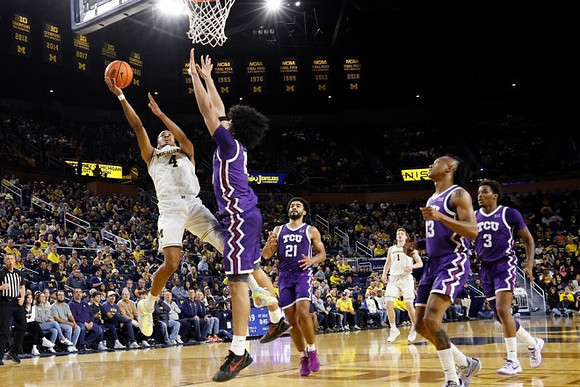 Nimari Burnett (4) and Danny Wolf (1)