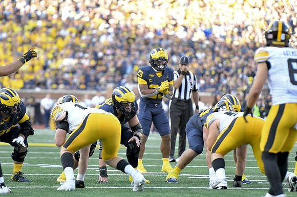 Jordan Marshall (23) and Blake Frazier (77)