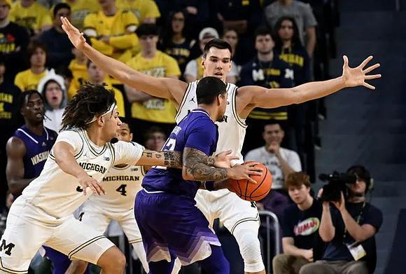 L.J. Cason (2), Nimari Burnett (4), and Vladislav Goldin (50)