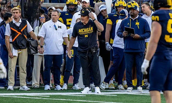 Kyle Whittingham and Michigan Team