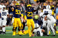 Jake Guarnera (53), Jordan Marshall (23), Jalen Hoffman (42), and Blake Frazier (77)