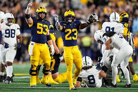 Jake Guarnera (53), Jordan Marshall (23), Jalen Hoffman (42), and Blake Frazier (77)