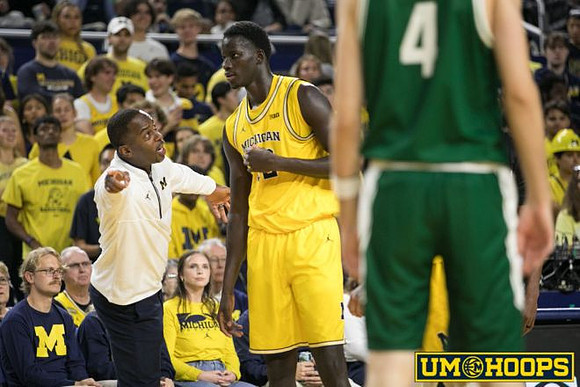 Mike Boynton Jr. and Moustapha Thiam (52)