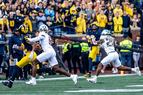 Kendrick Bell (12) and Davis Warren (16)