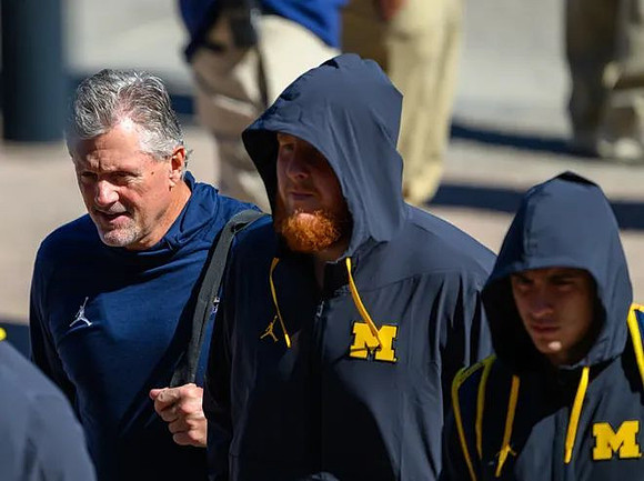 Kyle Whittingham and Michigan Team