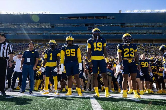 Rod Moore (1), Trey Pierce (95), Bryce Underwood (19), and Jordan Marshall (23)