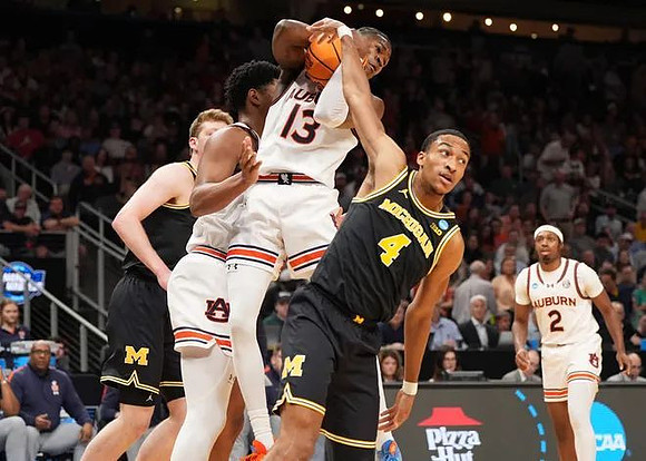 Danny Wolf (1) and Nimari Burnett (4)