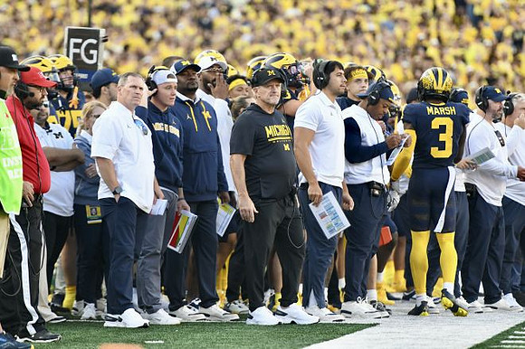 Kyle Whittingham and Michigan Team