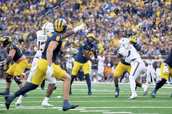 Blake Frazier (77), JJ Buchanan (6), and Bryce Underwood (19)