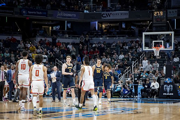 Maryland Head Coach Kevin Willard, Danny Wolf (1), Vladislav Goldin (50), and Tre Donaldson (3)