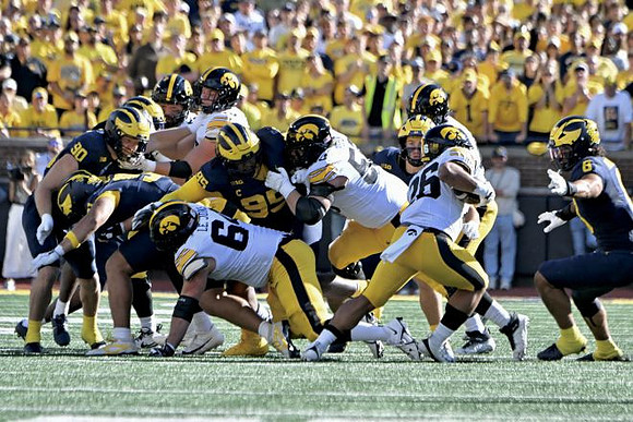 John Henry Daley (90), Trey Pierce (95), and Jordan Young (6)