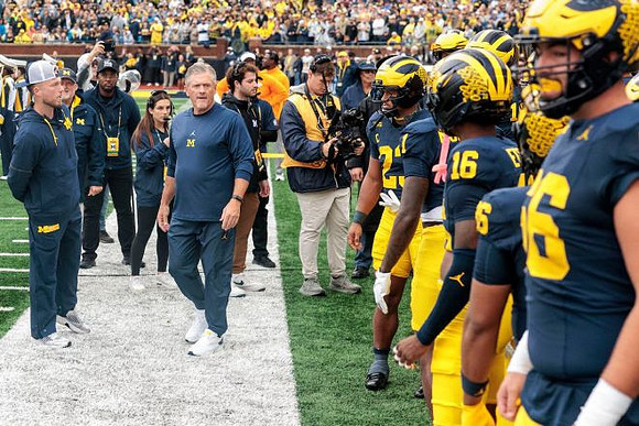 Kyle Whittingham and Michigan Team