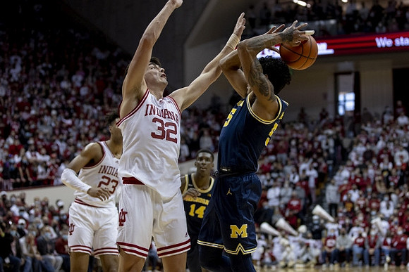 Eli Brooks (55) and Moussa Diabate (14)