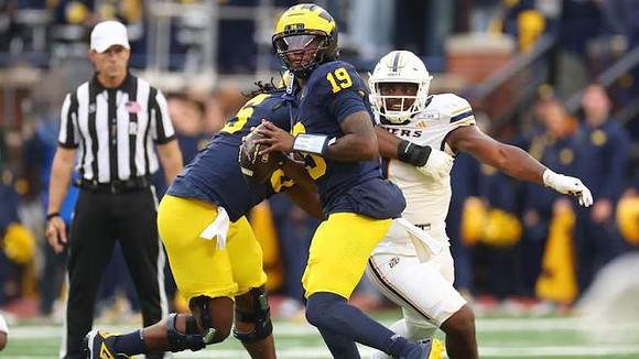 Nathan Efobi (55) and Bryce Underwood (19)