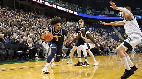 Tre Donaldson (3) and Sam Walters (24)