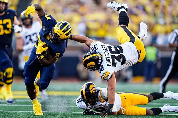 Savion Hiter (5) and Jake Guarnera (53)