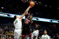 Jalen Reed (19), Elliot Cadeau (3), and Ricky Liburd (0)