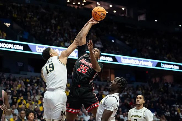 Jalen Reed (19), Elliot Cadeau (3), and Ricky Liburd (0)