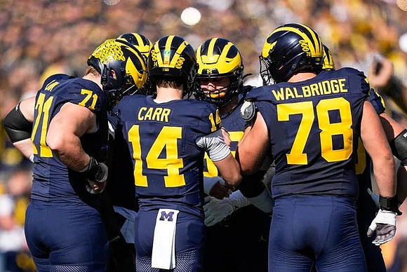 Evan Link (71), Tommy Carr (14), and Marky Walbridge (78)