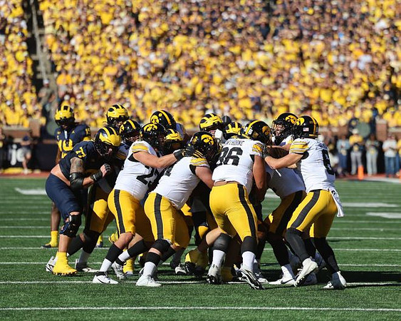 Blake Frazier (77) and Bryce Underwood (19)