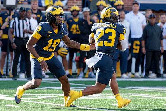 Bryce Underwood (19) and Jordan Marshall (23)