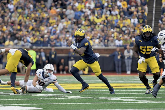 Bryce Underwood (19) and Nathan Efobi (55)