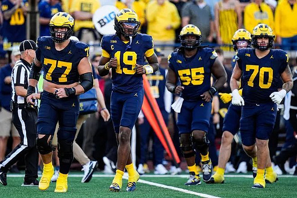Blake Frazier (77), Bryce Underwood (19), Nathan Efobi (55), and Brady Norton (70)