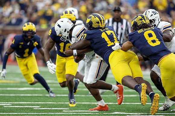 Rod Moore (1), Troy Bowles (18), Enow Etta (17), and Dom Nichols (8)