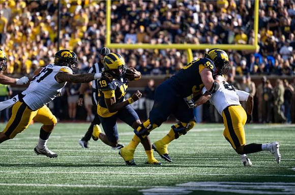 Bryce Underwood (19) and Jake Guarnera (53)