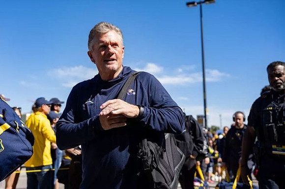Kyle Whittingham and Michigan Team
