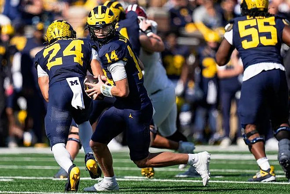 Bryson Kuzdzal (24), Tommy Carr (14), and Nathan Efobi (55)